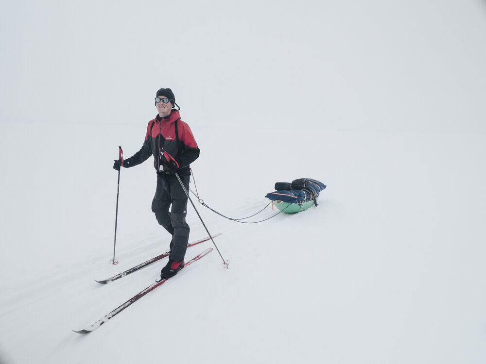 Inspiring Explorer Keith Parsons on skis with sled