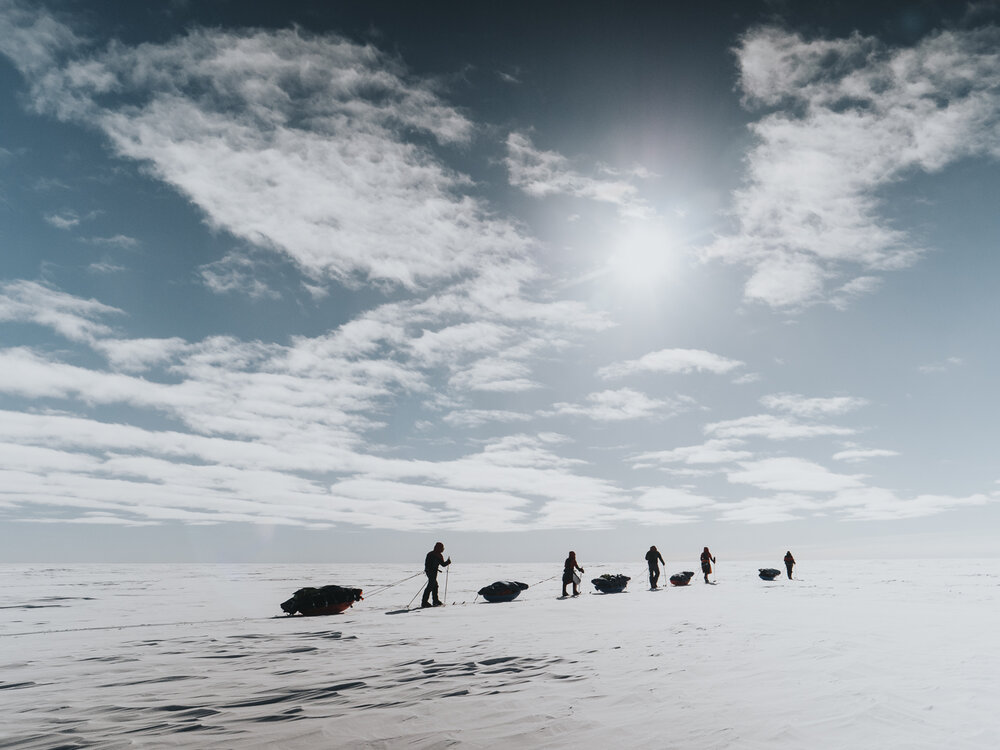 Inspiring Explorers Expedition&trade; team pull their sleds on a clear day (003)