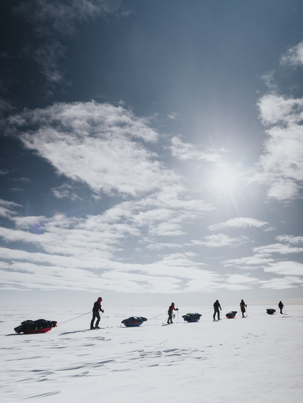 Inspiring Explorers Expedition&trade; team pull their sleds on a clear day (002)