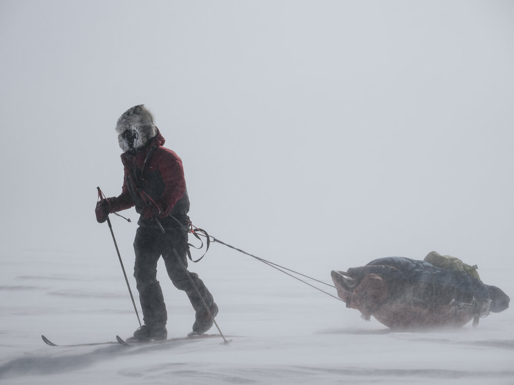 Inspiring Explorer Brando Yelavich pulls sled through wind