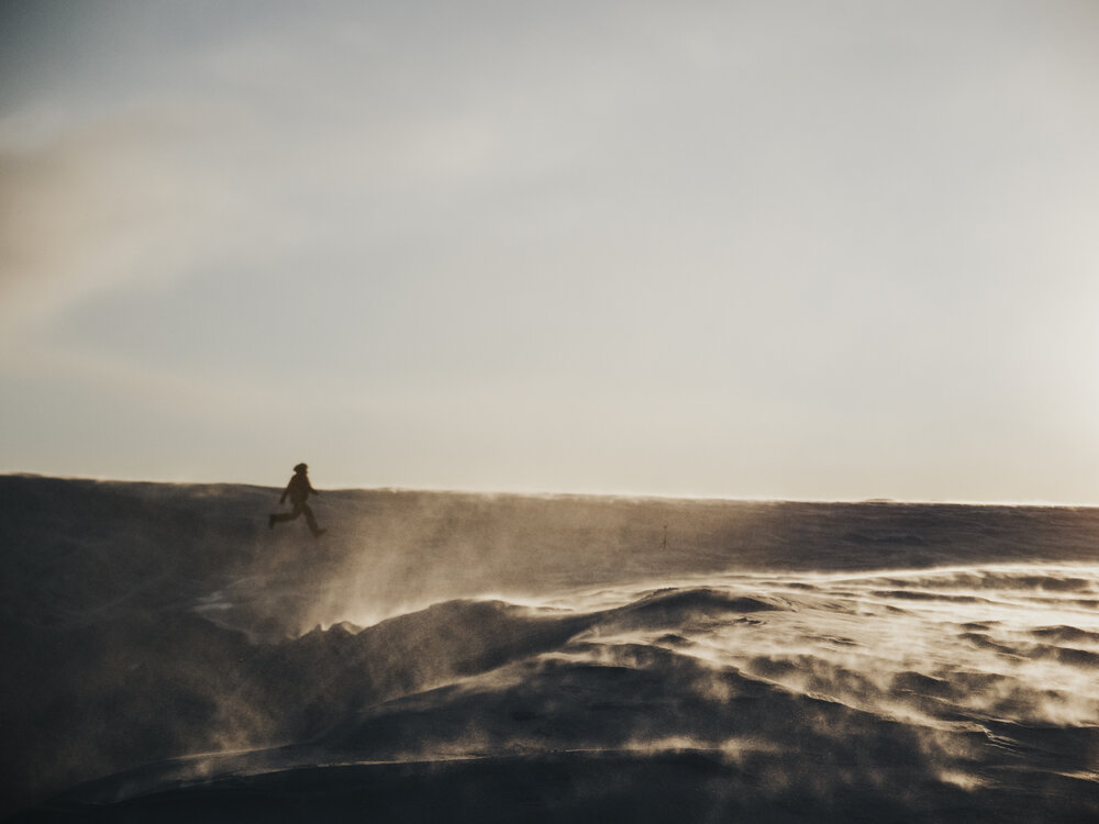 An Inspiring Explorer runs along a ridge