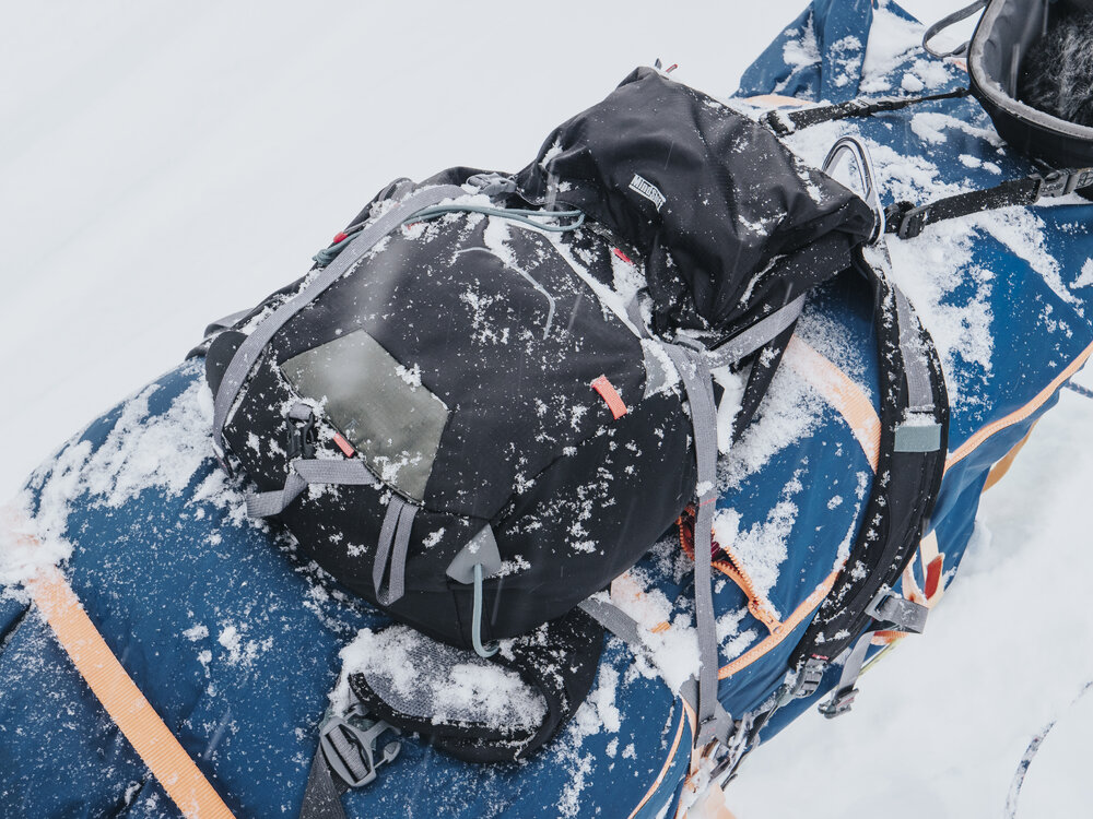 Backpack strapped to sled (001)