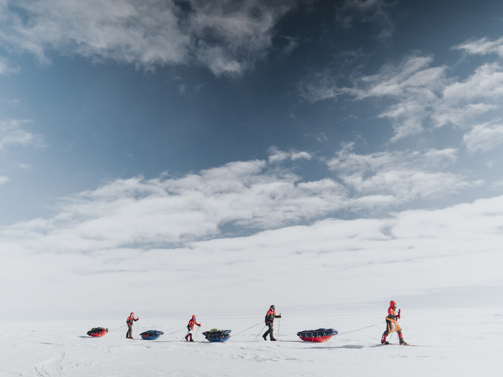 Inspiring Explorers Expedition&trade; team pulling sleds during the Greenland Ice Cap crossing