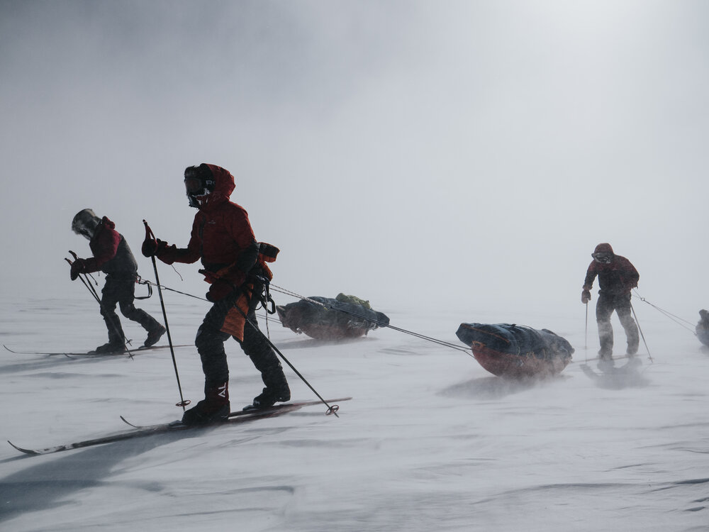 Inspiring Explorers Expedition&trade; team pulling sleds in windy conditions (001)