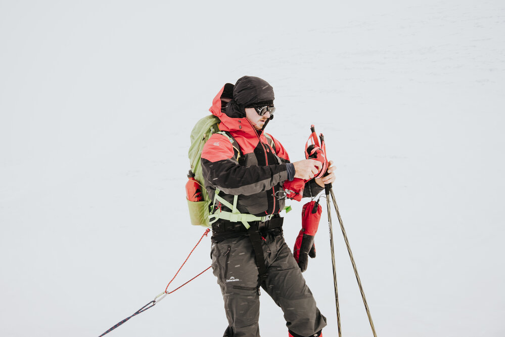 Inspiring Explorer Brando Yelavich adjusts equipment during the crossing