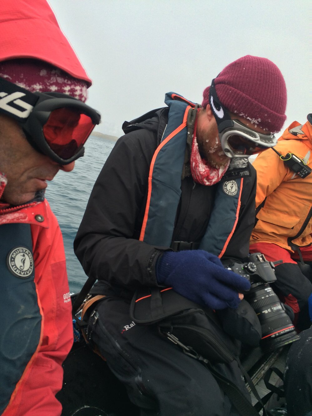 Inspiring Explorer James Blake checks his camera