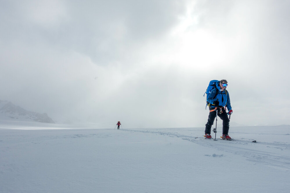 Antarctic Heritage Trust Executive Director Nigel Watson and another expedition member on skis during the crossing of South Georgia