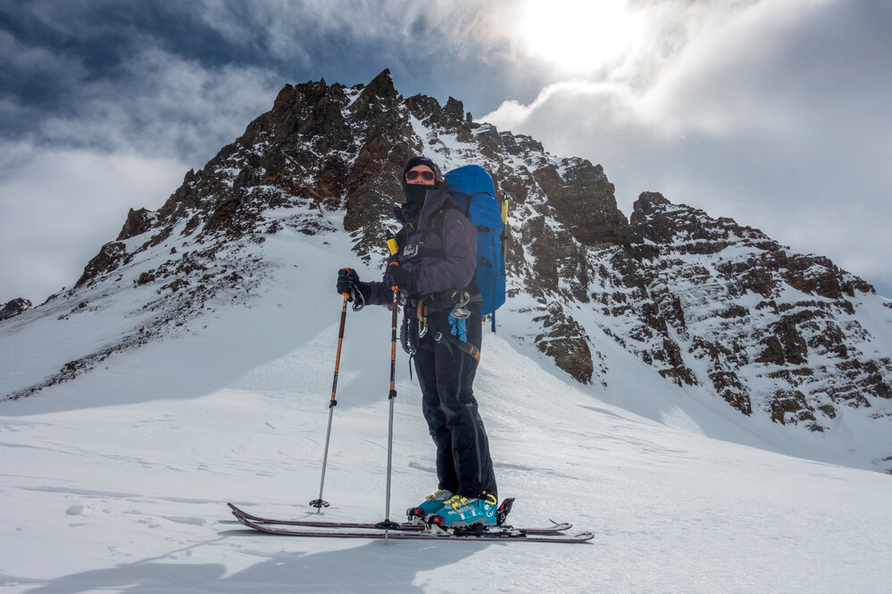 Inspiring Explorer Sin&eacute;ad Hunt arriving on skis at the top of a pass in South Georgia