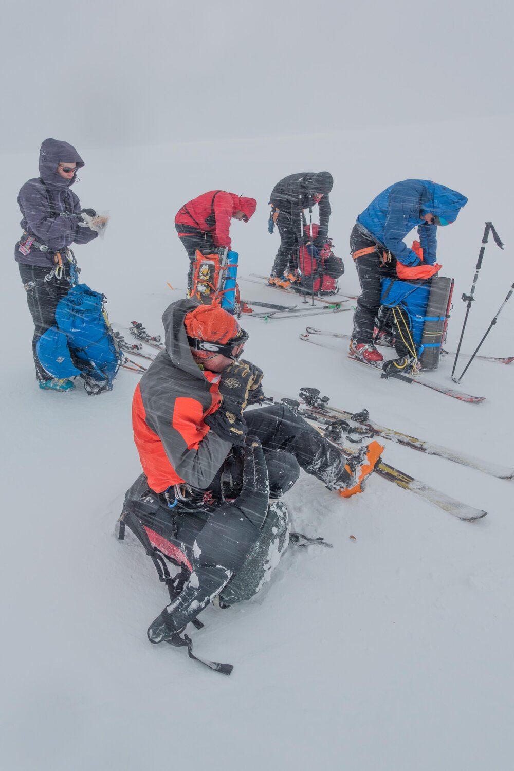 Members of the Antarctic Heritage Trust Inspiring Explorers Expedition&trade; taking a break in unpleasant windy conditions on their crossing of South Georgia