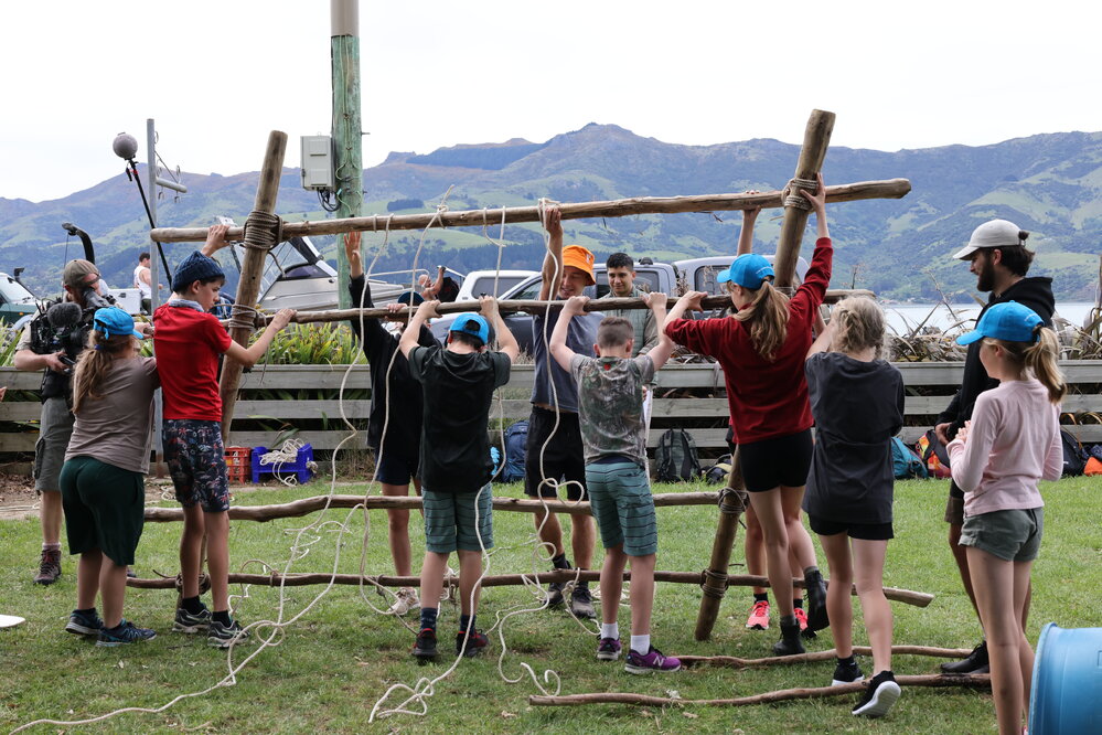 Young Inspiring Explorers flip their raft over during building (002)