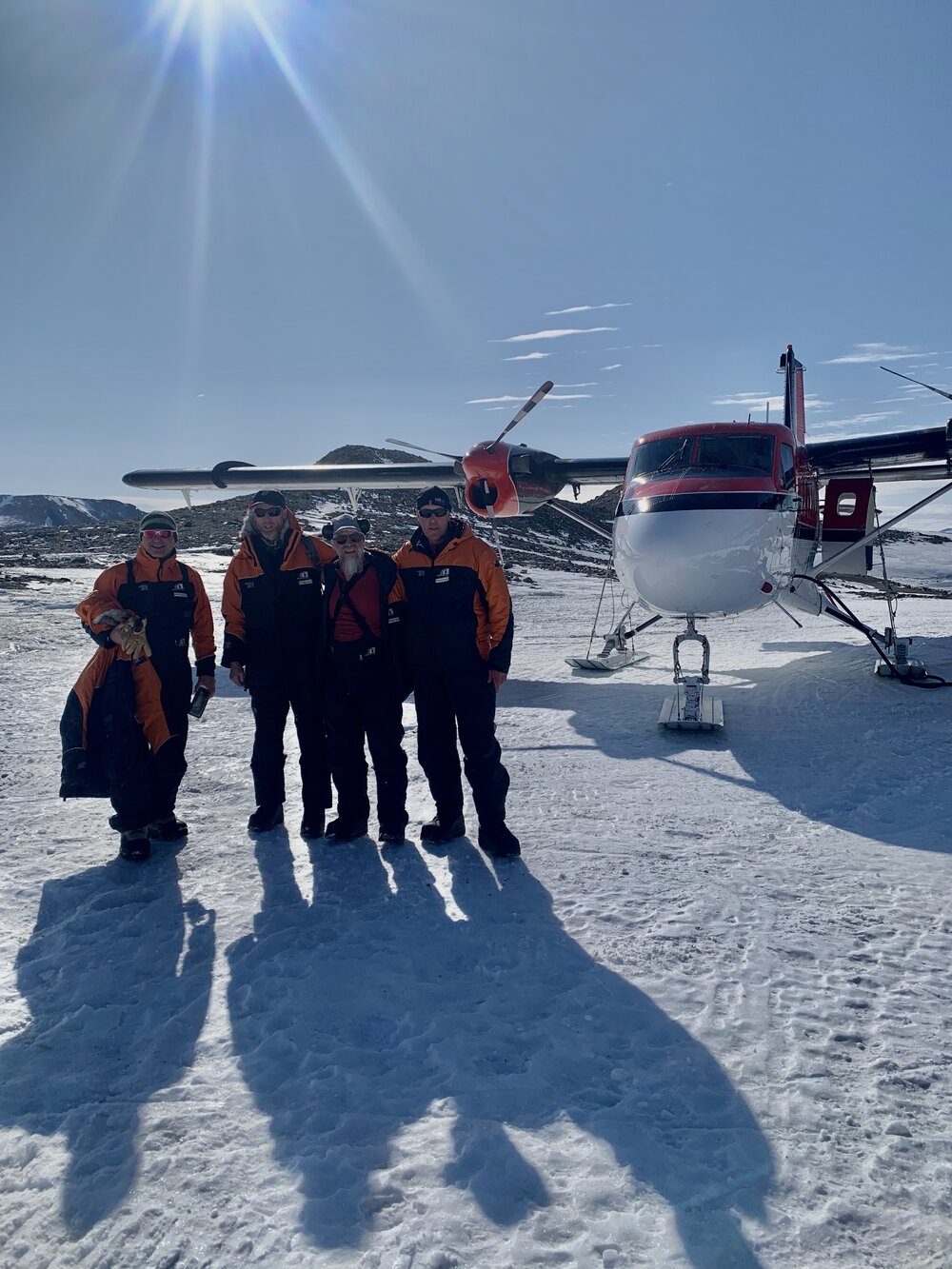 The 2019-20 Cape Adare team in front of a plane (003)
