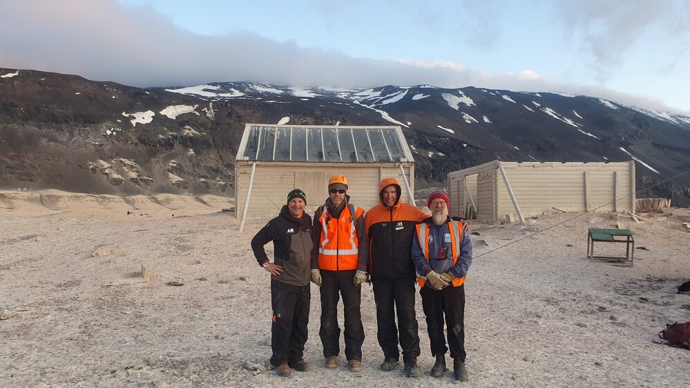 2019-20 Cape Adare field camp input team in front of Borchgrevink's hut