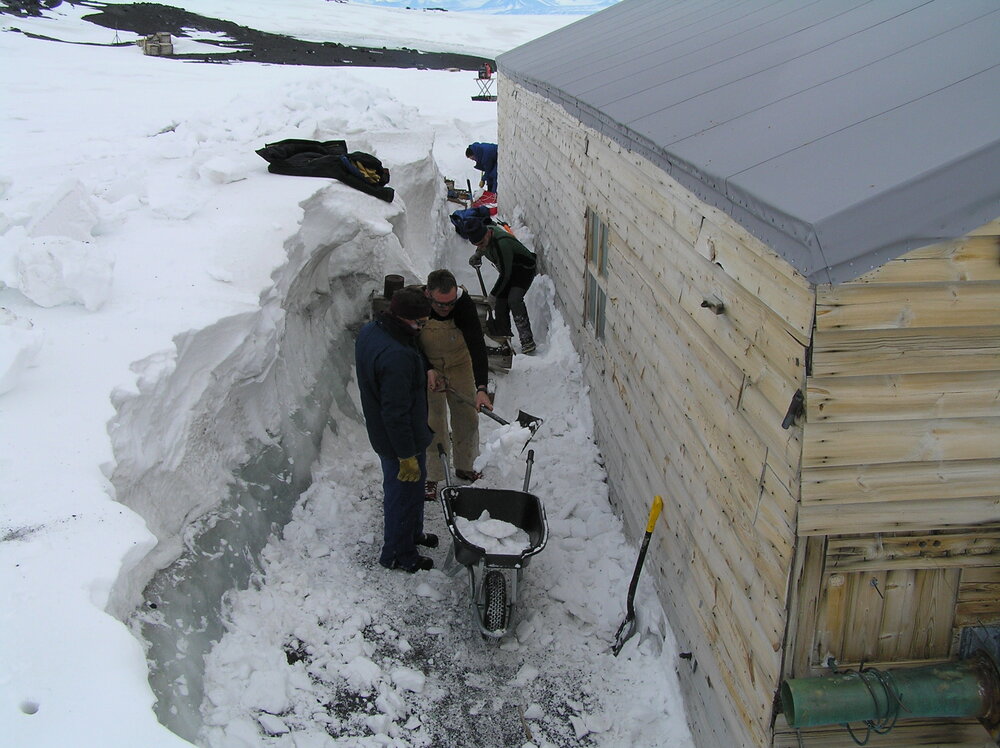 2005 Snow removal from the South wall, Scott's 'Terra Nova' hut, Cape Evans