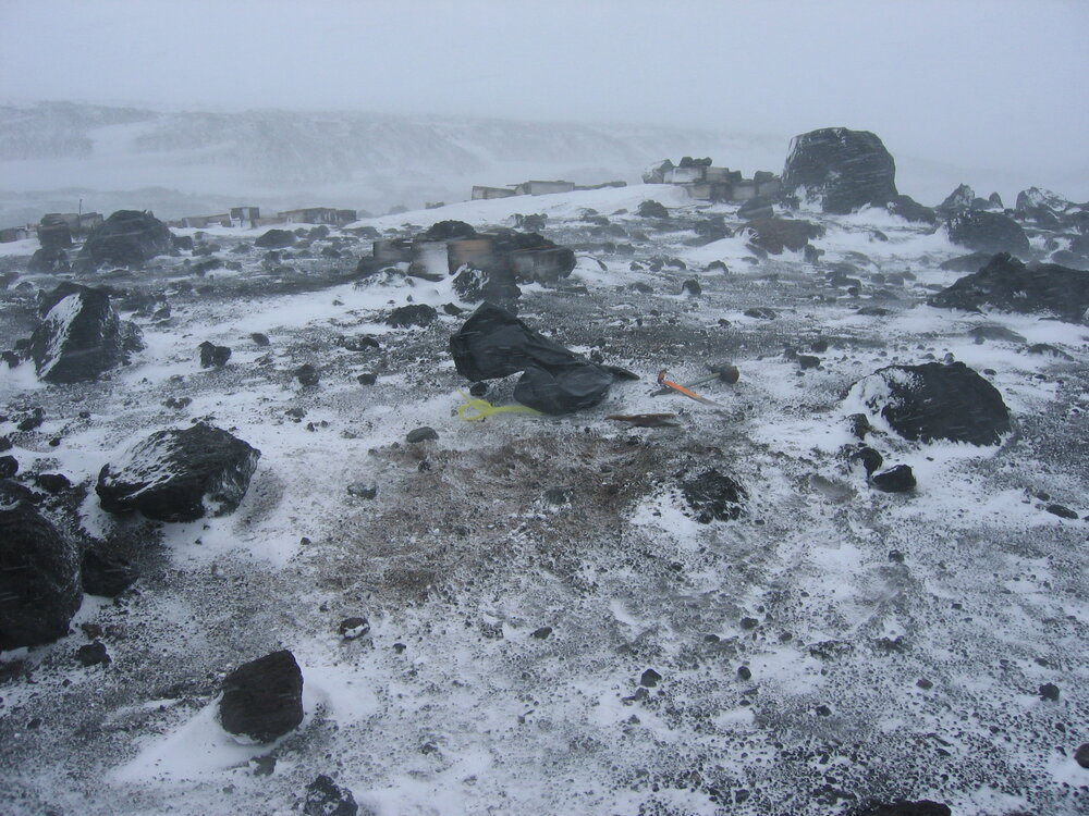 2005 Southern stores split wheat sit under snow, Cape Evans (002)