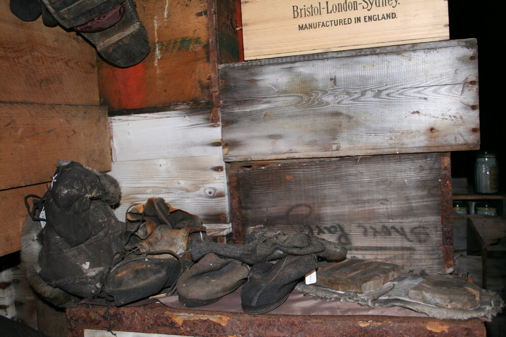 2006 Shoes stacked on boxes inside Scott's 'Terra Nova' hut, Cape Evans
