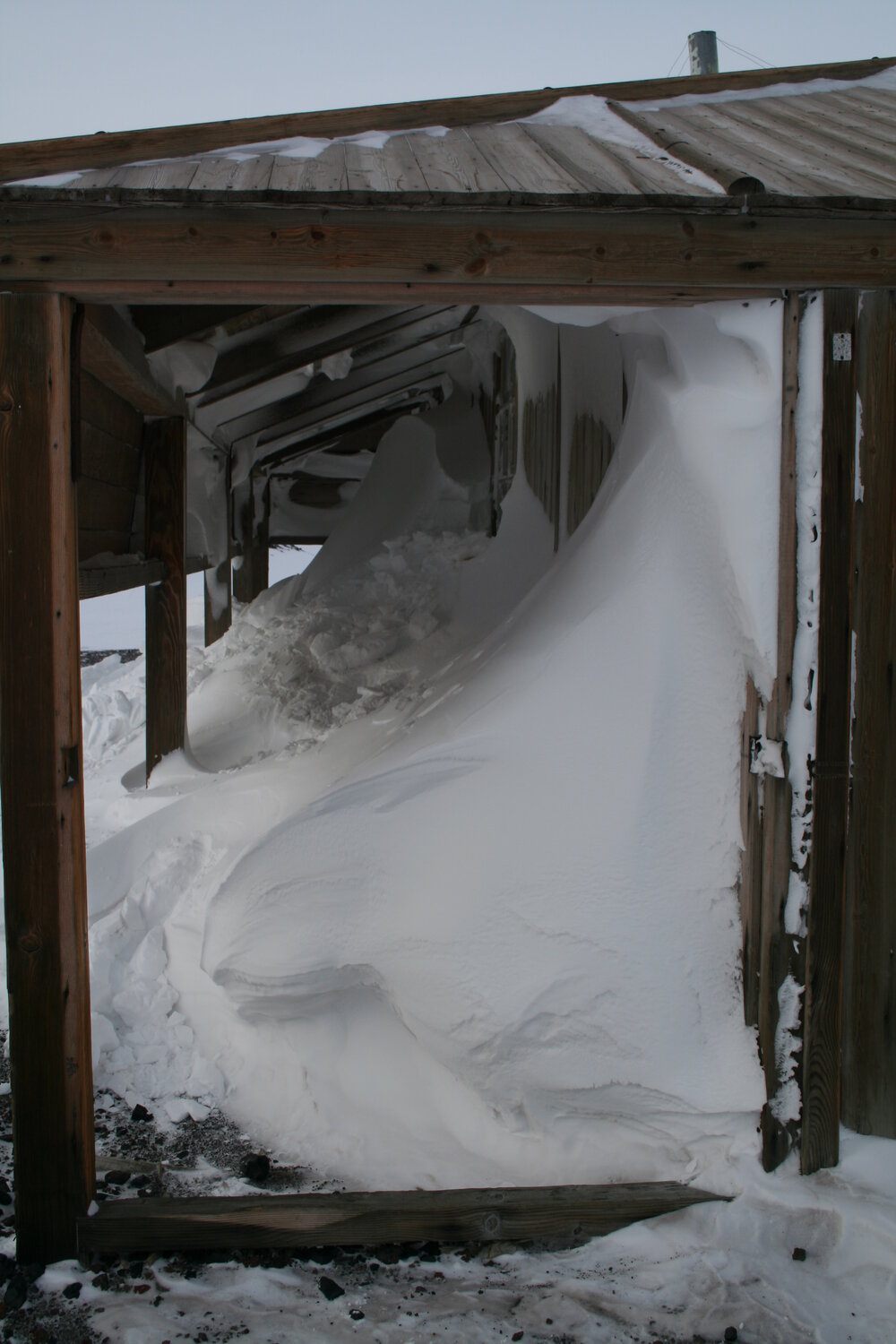 2006 Snow build-up under the eaves of Scott's 'Discovery' hut, Hut Point