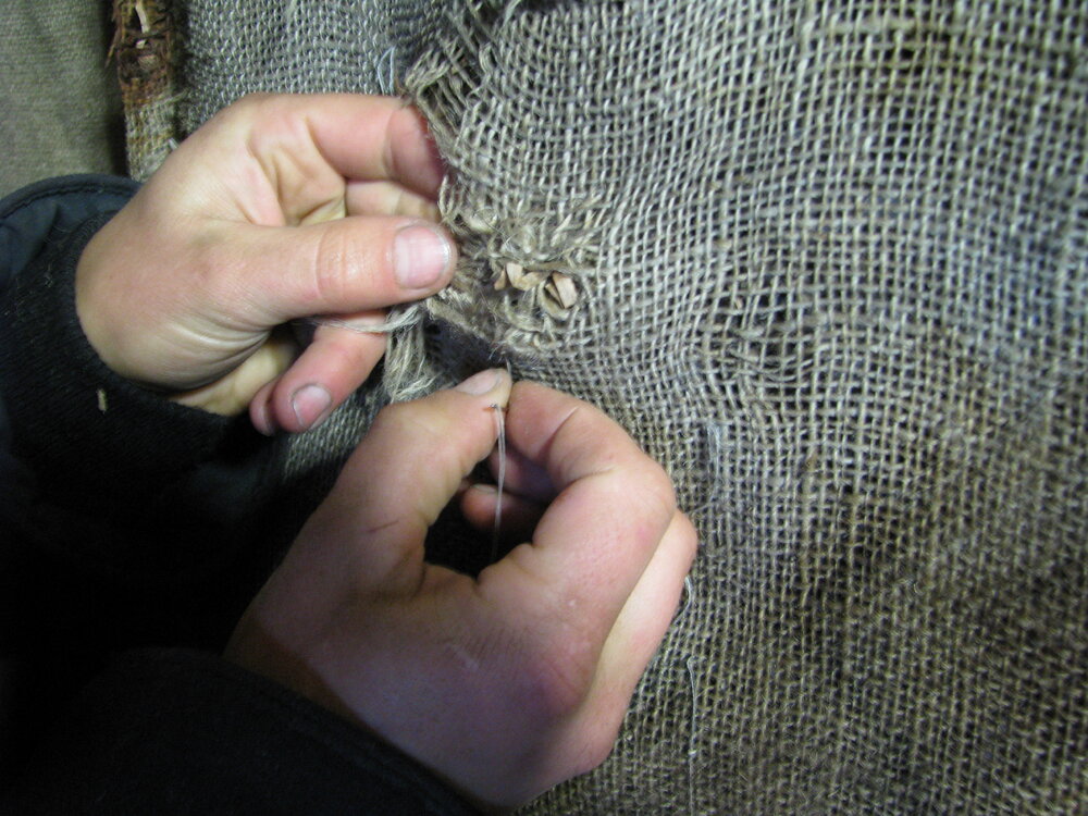 2009-10 Gibson's quilting during repairs, Stables, Scott's 'Terra Nova' hut