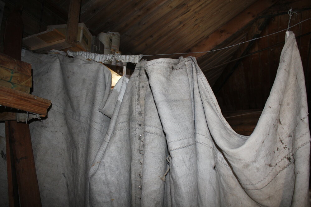 2019-20 Reference image - Dividing curtains in main room, Shackleton's 'Nimrod' Hut (001)