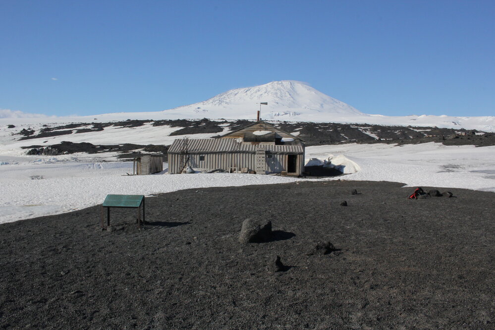 2019-20 Hut inspection - West elevation with Mount Erebus beyond, Scott's Hut, Cape Evans (001)