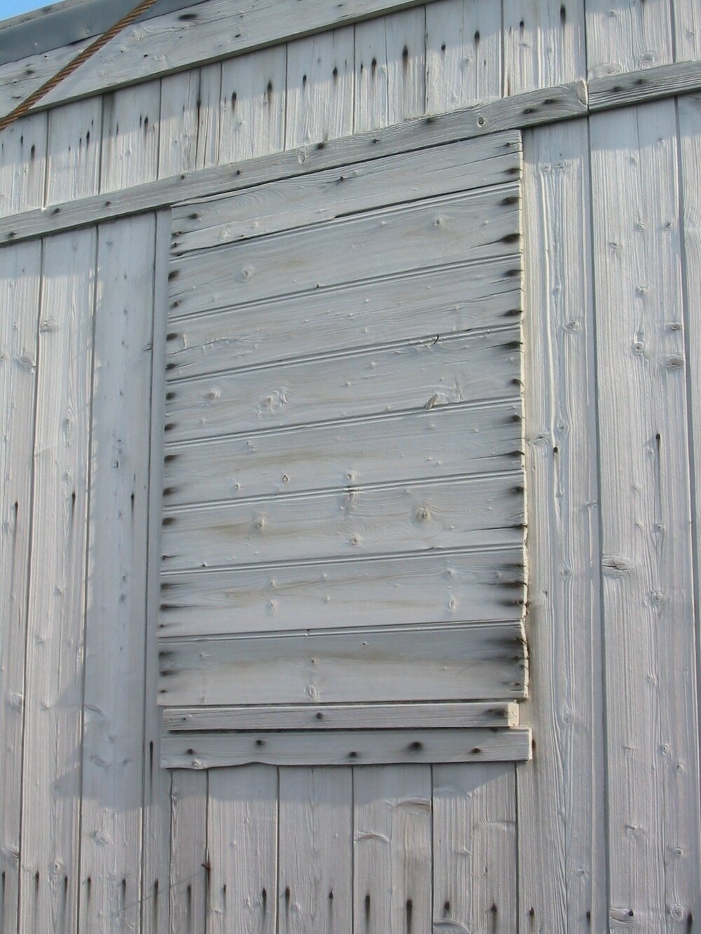2003 K440 at Shackleton's 'Nimrod' hut, exterior - boarded window, South-west corner
