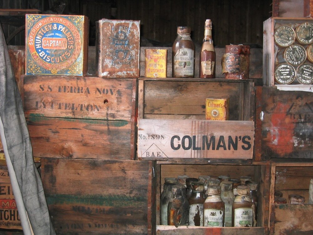 2003 K440 at Scott's 'Terra Nova' hut, interior - Galley provisions and cases forming bulkhead