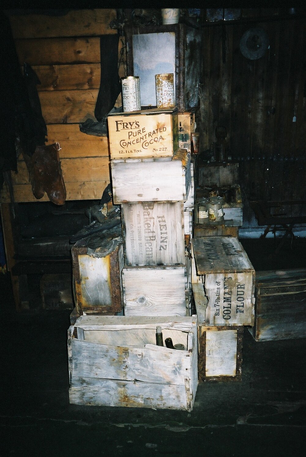 2002 Scott's 'Terra Nova' hut, interior - Galley bulkhead stores boxes (001)