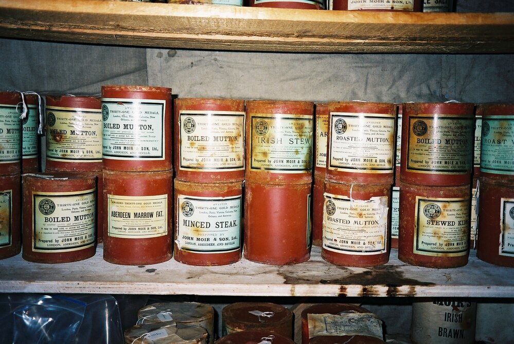 2002 Shackleton's 'Nimrod' hut, interior - Tinned food items (001)