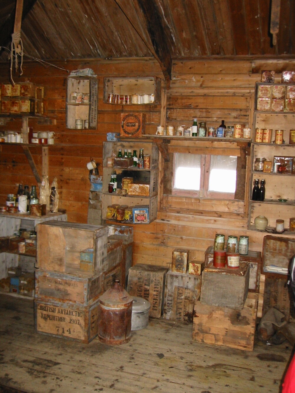 2002 K440B to Shackleton's 'Nimrod' hut, interior - Stores on South wall (001)