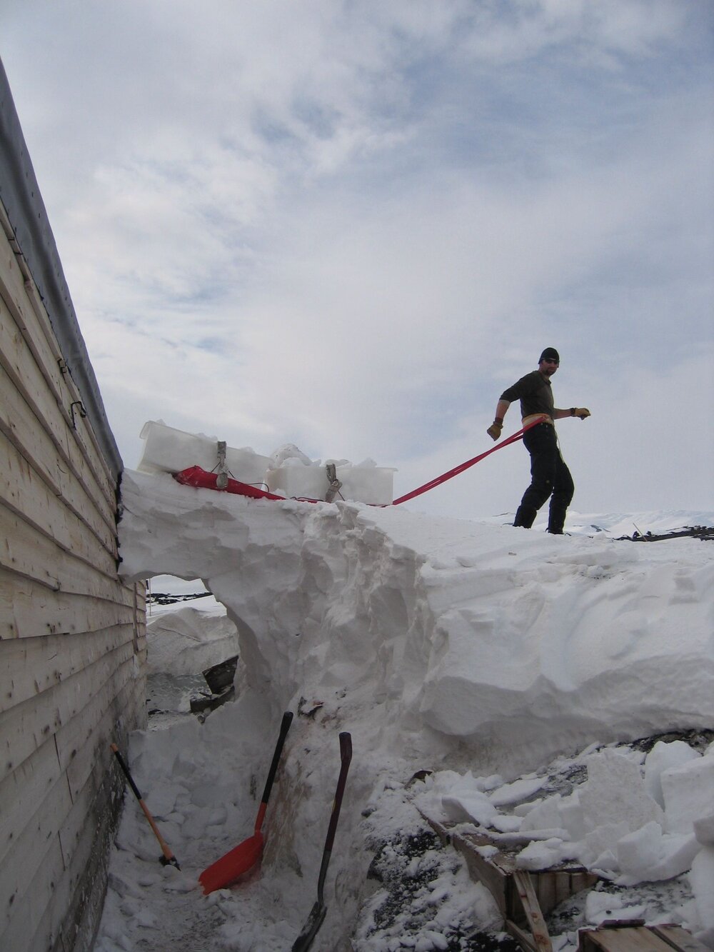 2007-08 AHT Antarctic Coordinator Matthew Brown man hauling snow 