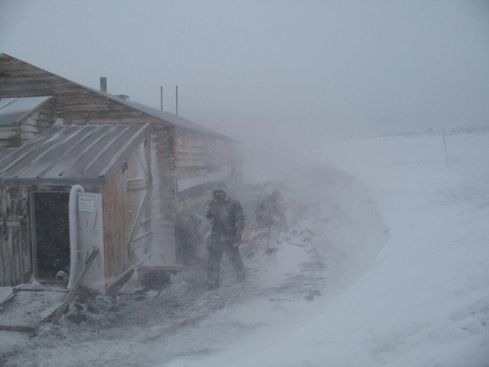 K170 team in a storm, Scott's 'Terra Nova' Hut 