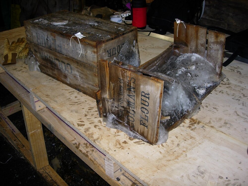 Excavated Colman's boxes showing ice build-up