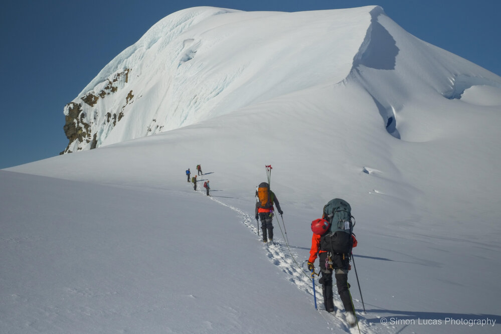The Inspiring Explorers Expedition&trade; team approach the summit of Mount Scott