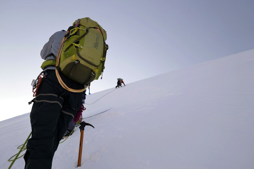 Down-climbing from the summit of Mount Scott