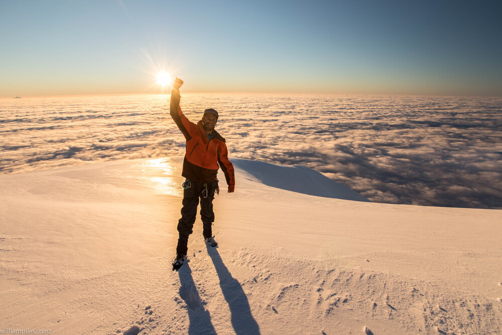 Inspiring Explorer Simon Lucas on the summit of Mount Scott