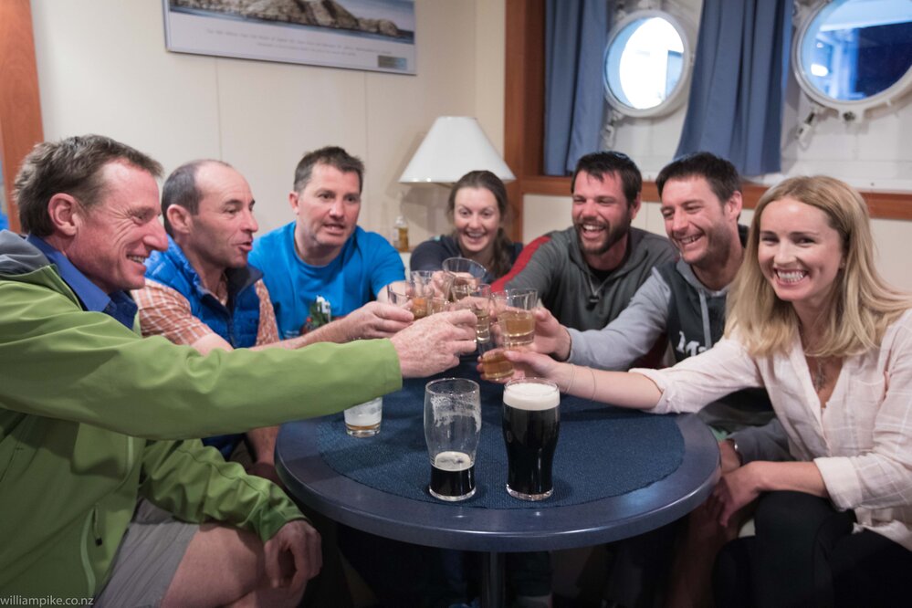 Inspiring Explorers team members celebrate their successful climb of Mount Scott