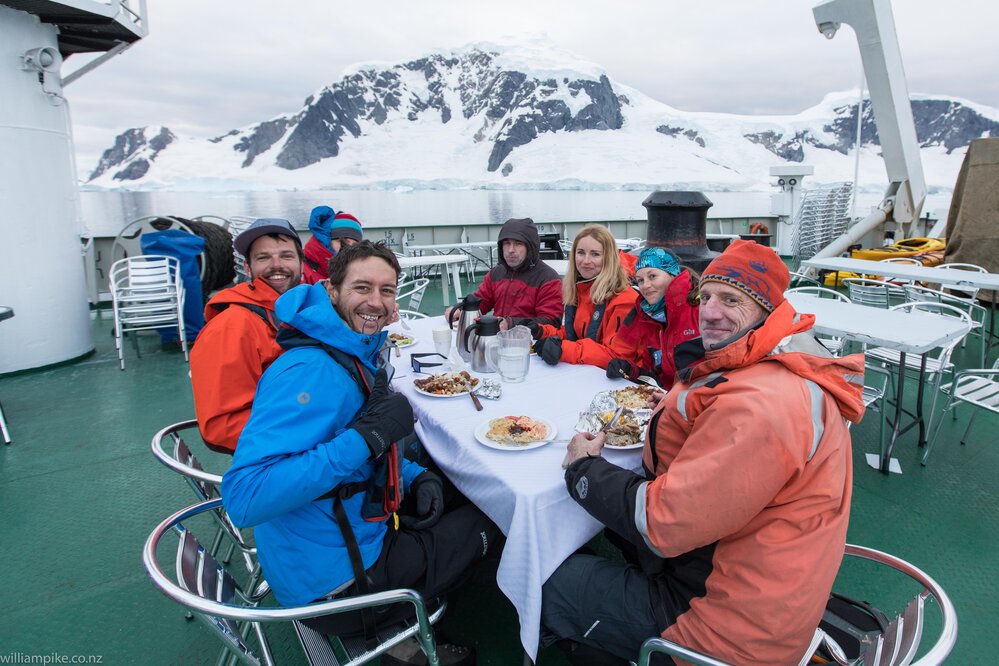 The Inspiring Explorer team eat out in the Antarctic
