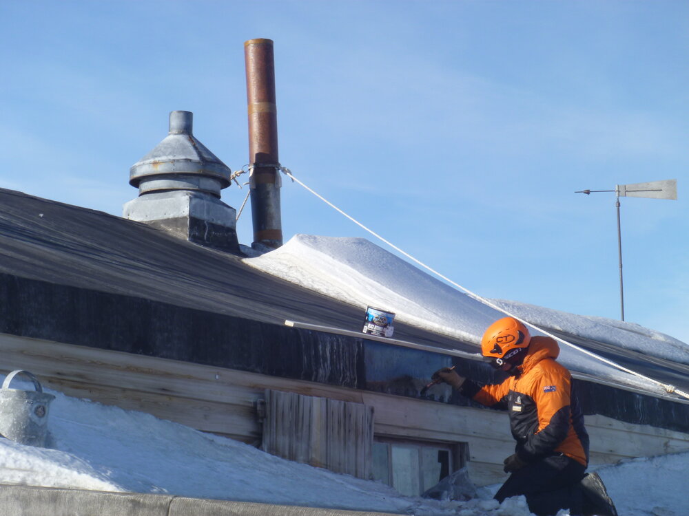 Painting the roof of Scott's 'Terra Nova' hut (004)