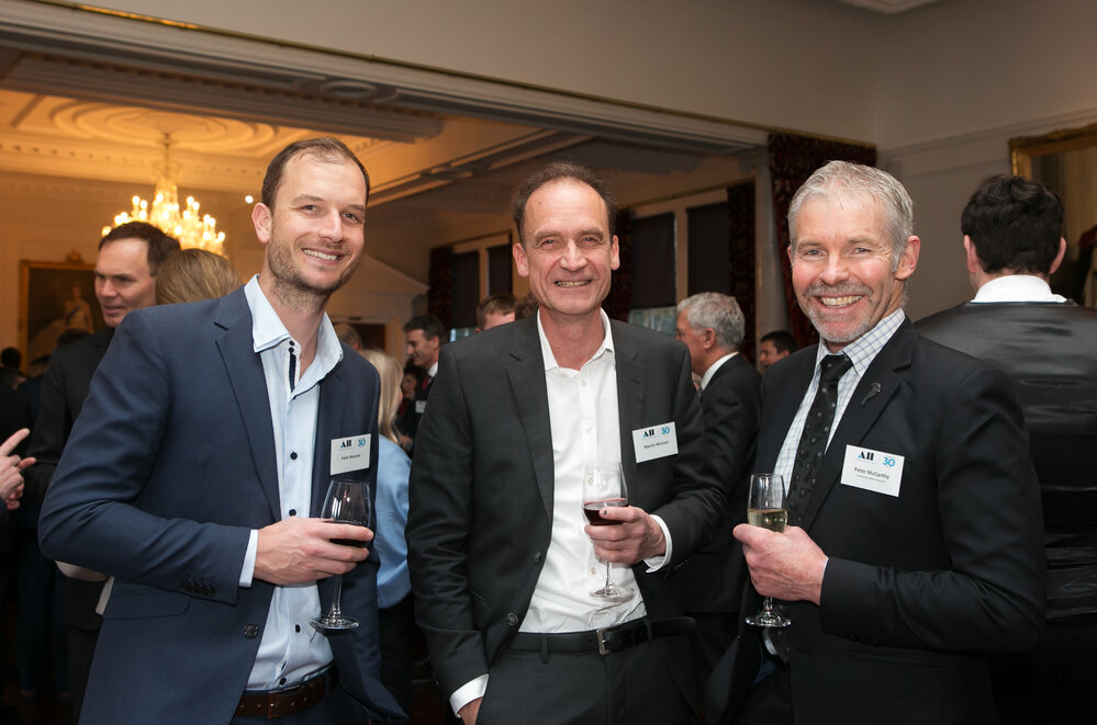 Conservation carpenter Martin Wenzel and son Felix with Antarctic New Zealand's Peter McCarthy