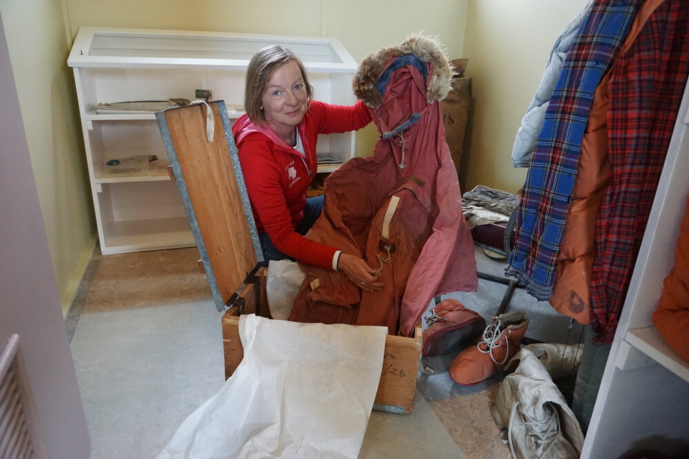 2019-20 Conservator Nicola Stewart with cotton parka donated by Arnold Heine. 