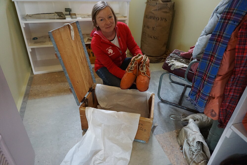 2019-20 Conservator Nicola Stewart with tent booties donated by Arnold Heine. 