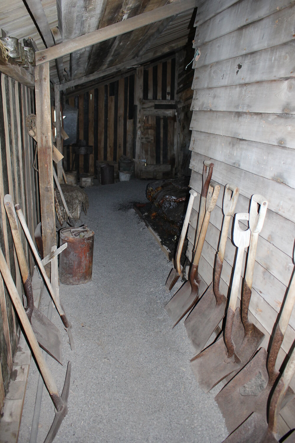 2019-20 Shovels lined up in Western Annexe of Scott's 'Terra Nova' Hut (001)
