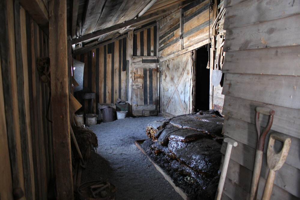 2019-20 Seal blubber and shed supplies in Western Annexe of Scott's 'Terra Nova' Hut