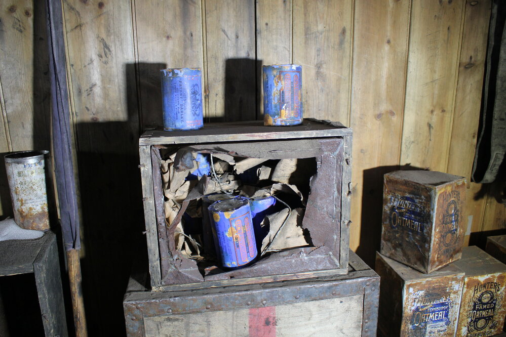 2019-20 Opened boxes of 'Robinson's "Patent" barley' in Scott's 'Discovery' Hut