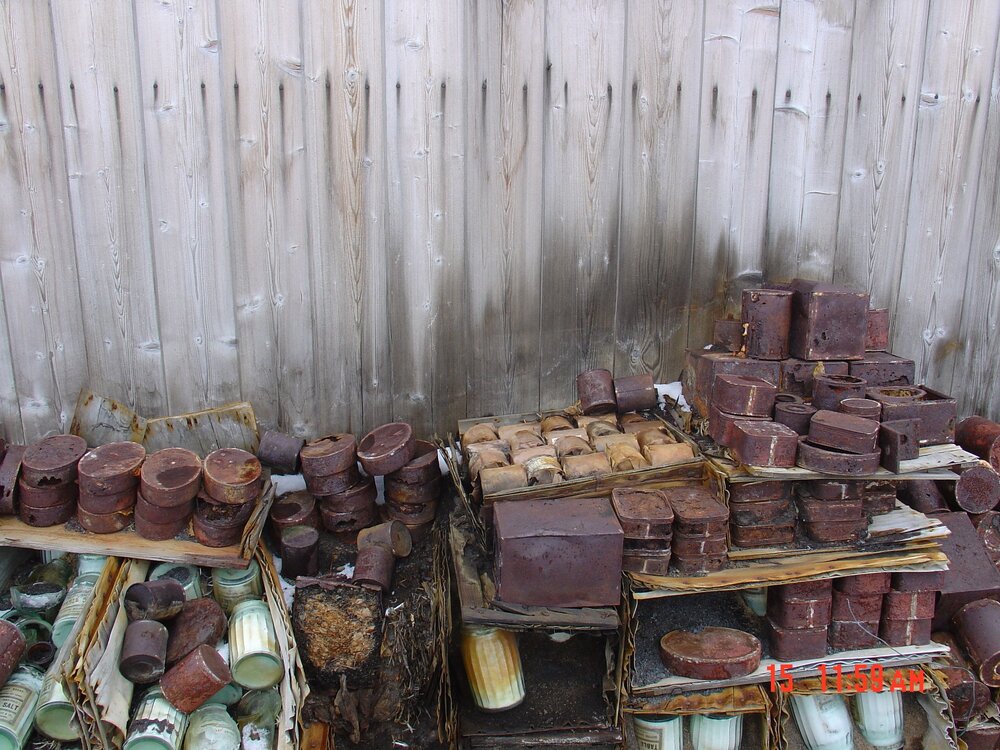 2003-04 Broken Venesta boxes along southern exterior wall, Shackleton's 'Nimrod' Hut (001)