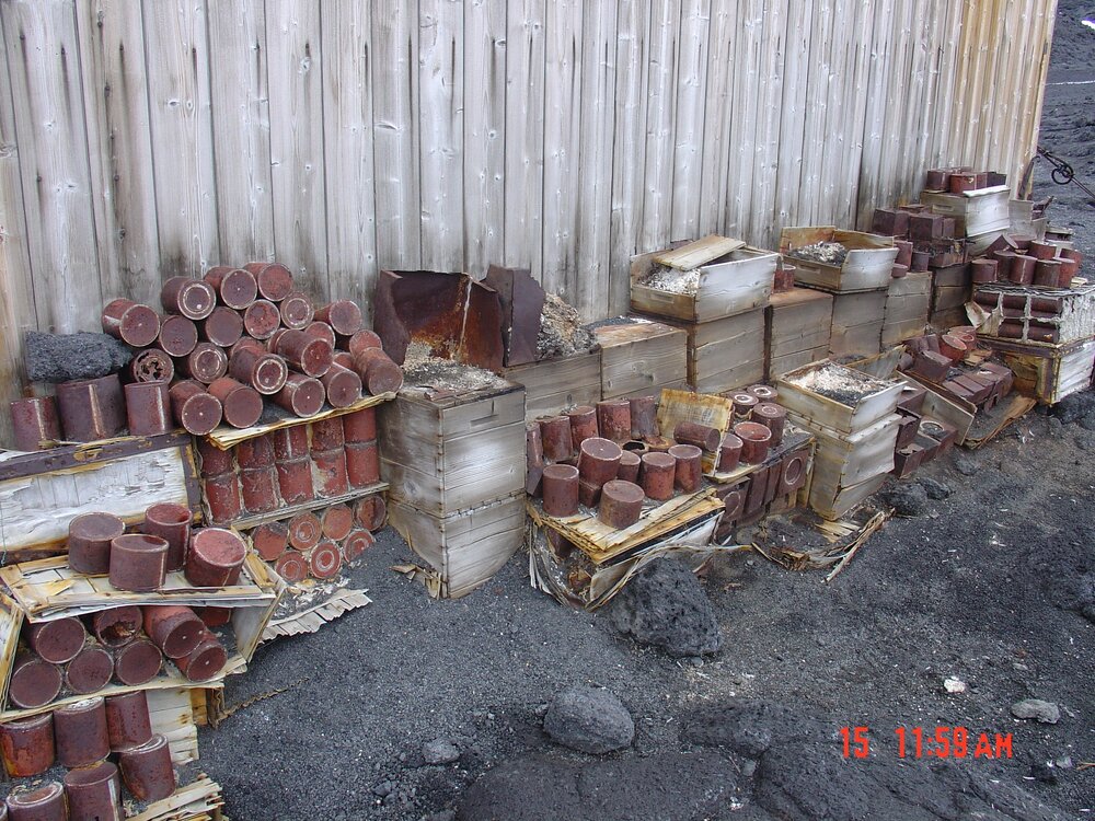 2003-04 Disintegrating Venesta boxes along southern exterior wall, Shackleton's 'Nimrod' Hut (003)