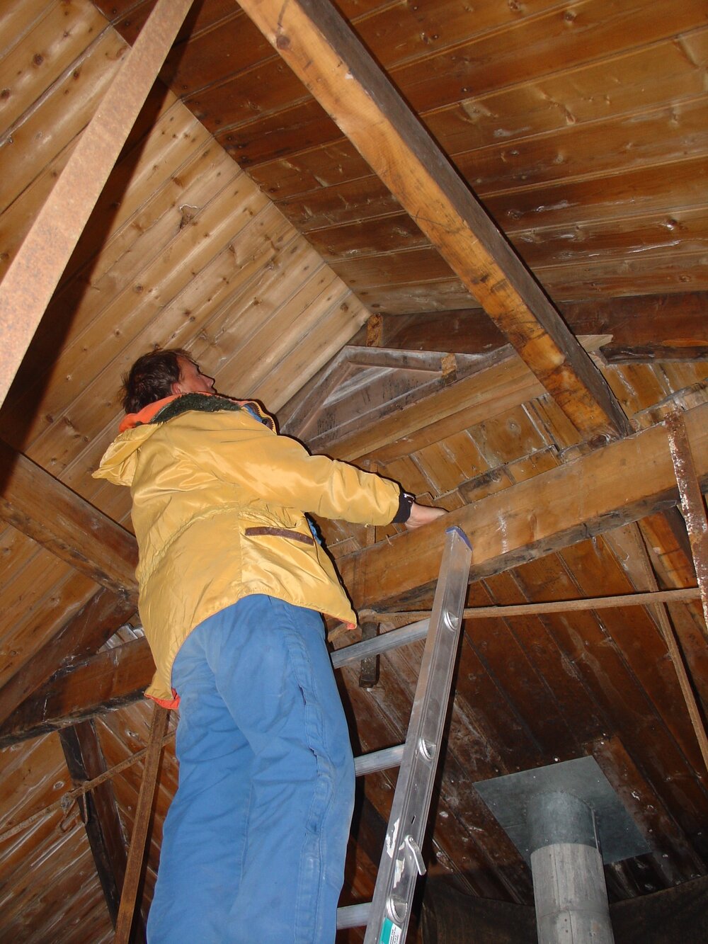 2003-04 Arrow International's Noel Saxon assessing the rafters in Shackleton's 'Nimrod' Hut 