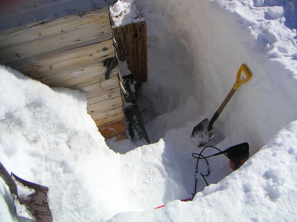 2002-03 Excavating ice, south east corner of Scott's 'Terra Nova' Hut