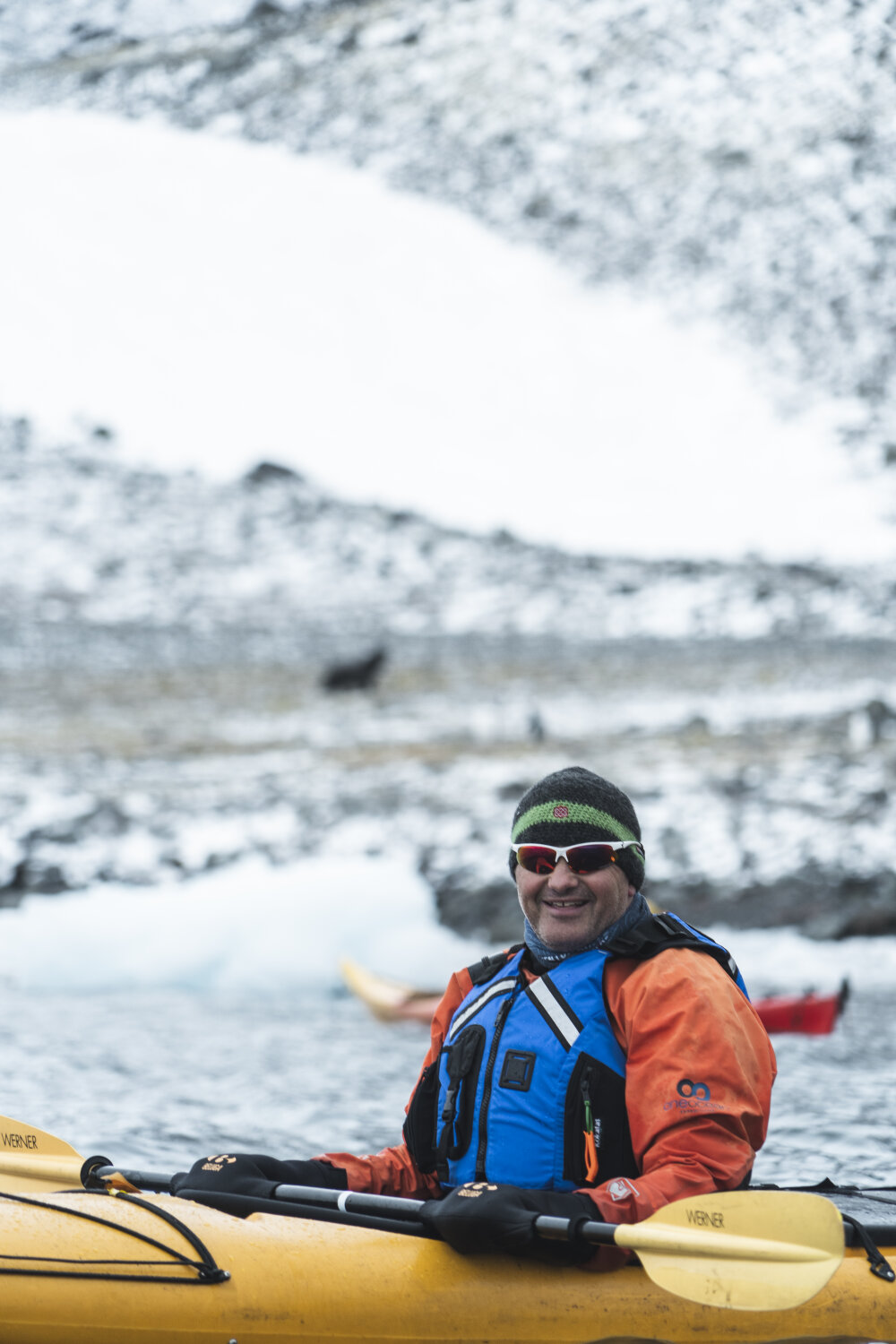 AHT Executive Director Nigel Watson in kayak on Antarctic Peninsula