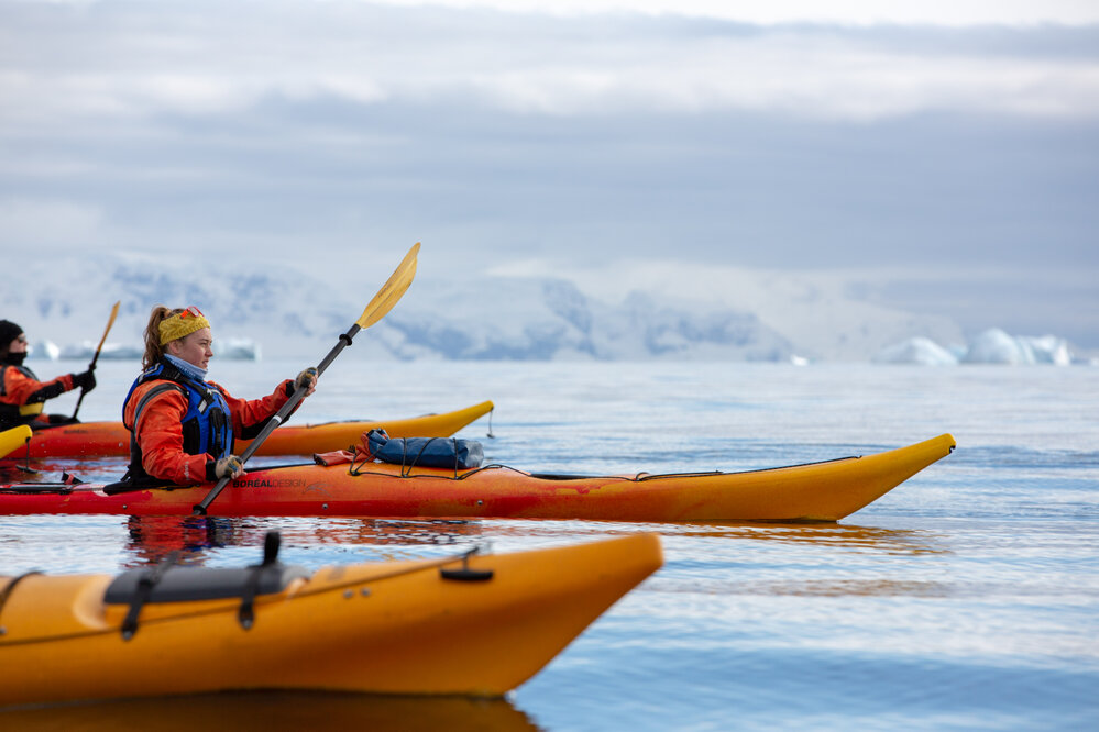 Inspiring Explorer Leah Stewart kayaking calm Antarctic Peninsula waters