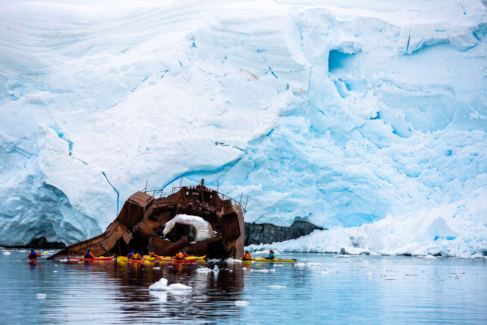 Kayakers investigate wreck of the 'Governoren' in Foyn Harbour